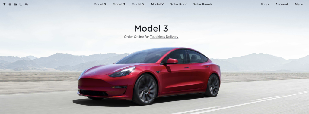 homepage Tesla yang menjadi pelopor di industri kendaraan listrik
